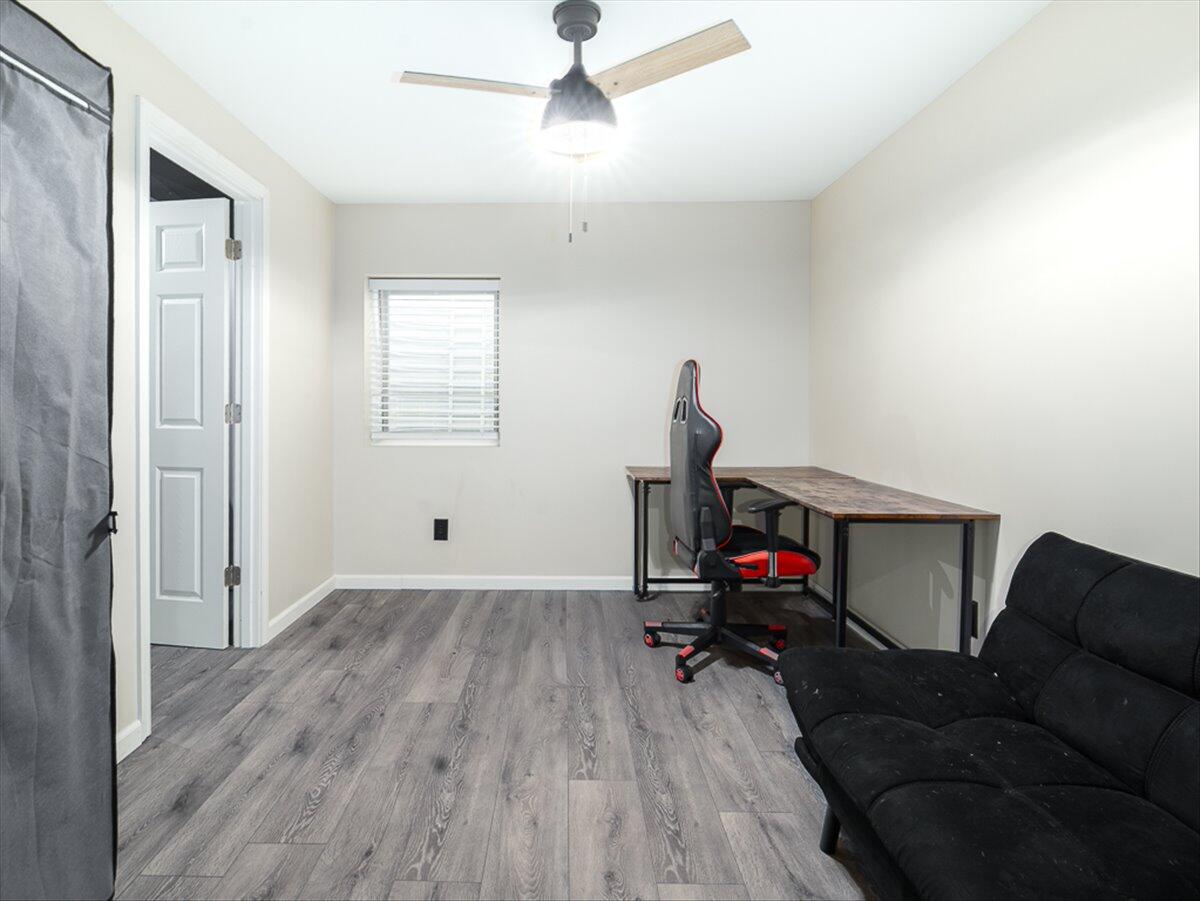 10377 Nevada Place Crown Point, IN 46307 - Photo 20 of 21 a living room with furniture and a wooden floor