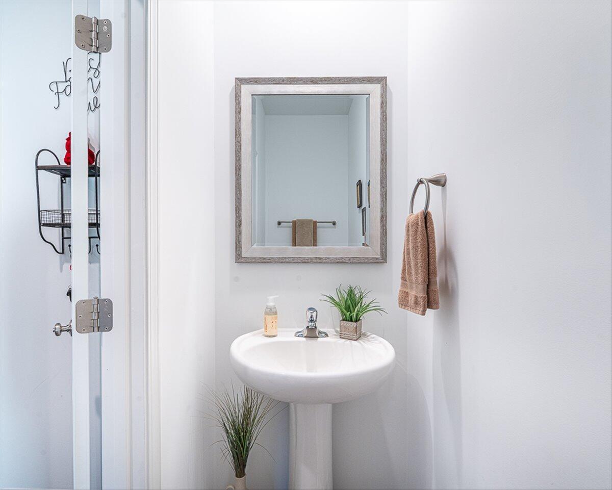 10377 Nevada Place Crown Point, IN 46307 - Photo 9 of 21 a bathroom with a sink and a mirror