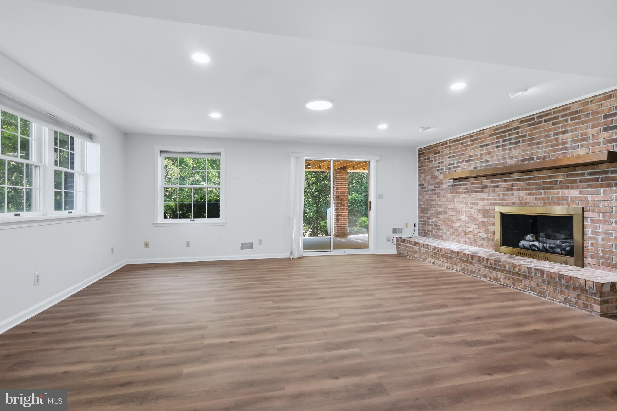 23500 River Road Lexington Park, MD 20653 - Photo 68 of 92 an empty room with windows and fireplace
