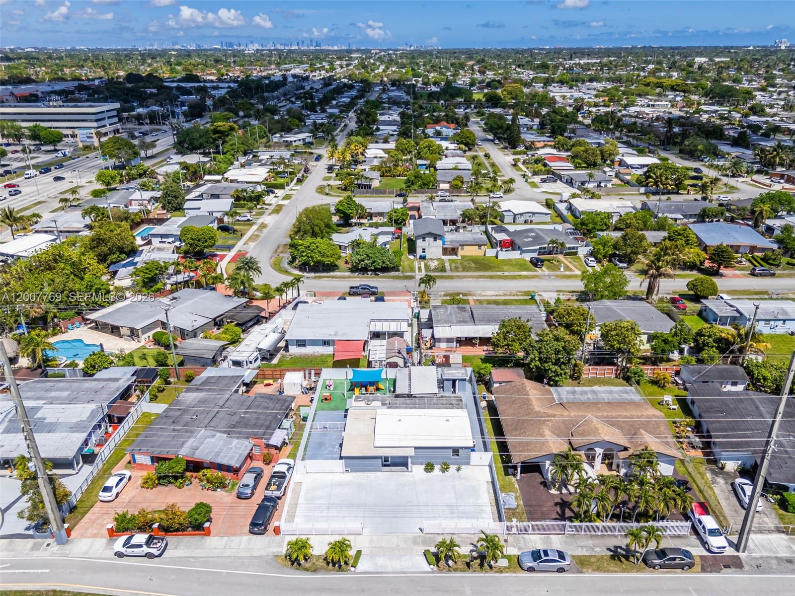 4041 Southwest 117th Avenue Miami, FL 33175 - Photo 15 of 47 an aerial view of a city with lots of residential buildings