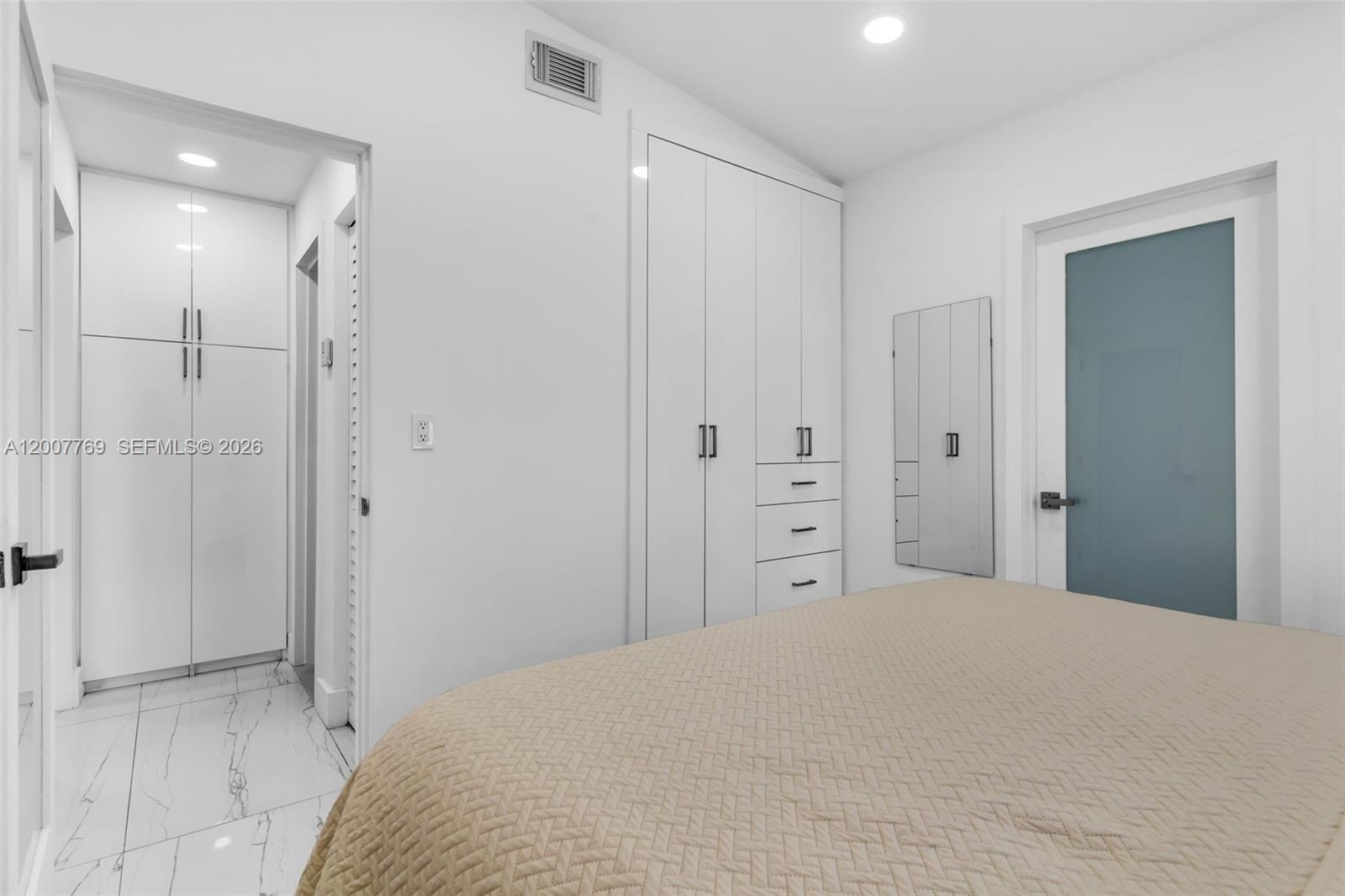 4041 Southwest 117th Avenue Miami, FL 33175 - Photo 33 of 47 a bedroom with a bed and a bathroom
