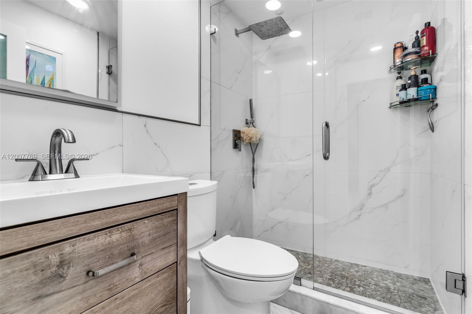 4041 Southwest 117th Avenue Miami, FL 33175 - Photo 34 of 47 a bathroom with a sink a toilet and shower
