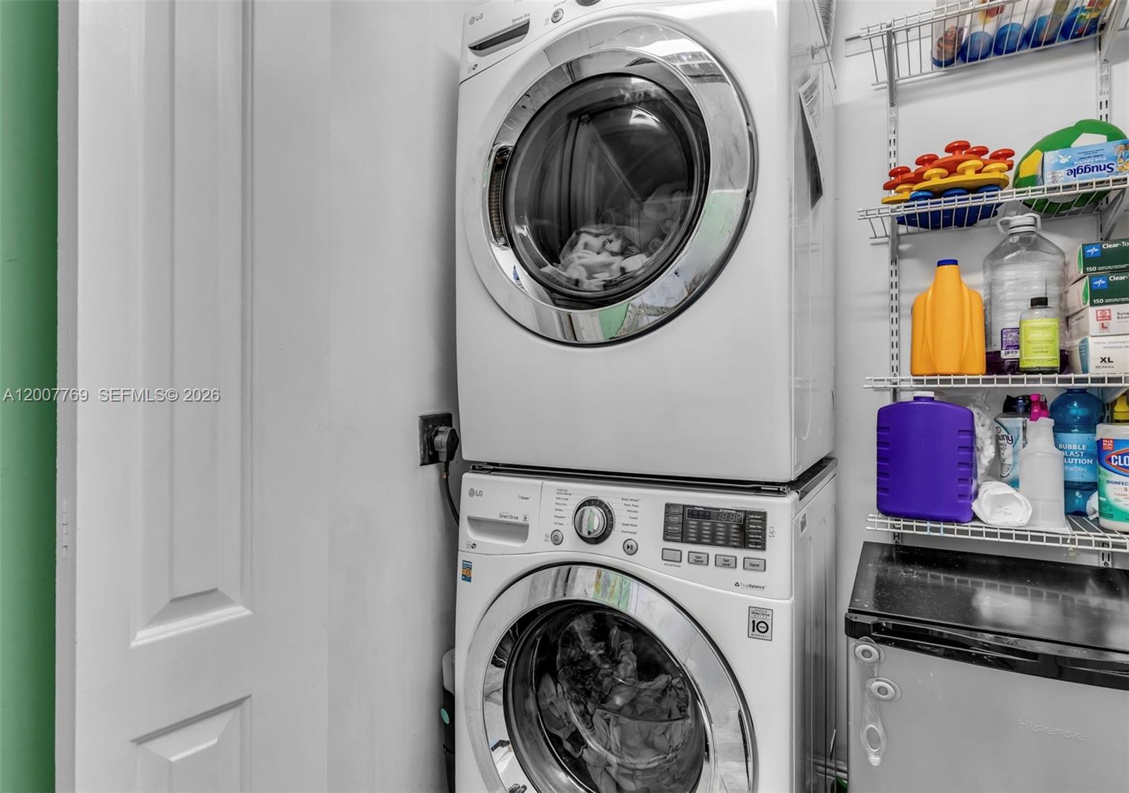 4041 Southwest 117th Avenue Miami, FL 33175 - Photo 40 of 47 a view of storage and utility room with washer and dryer