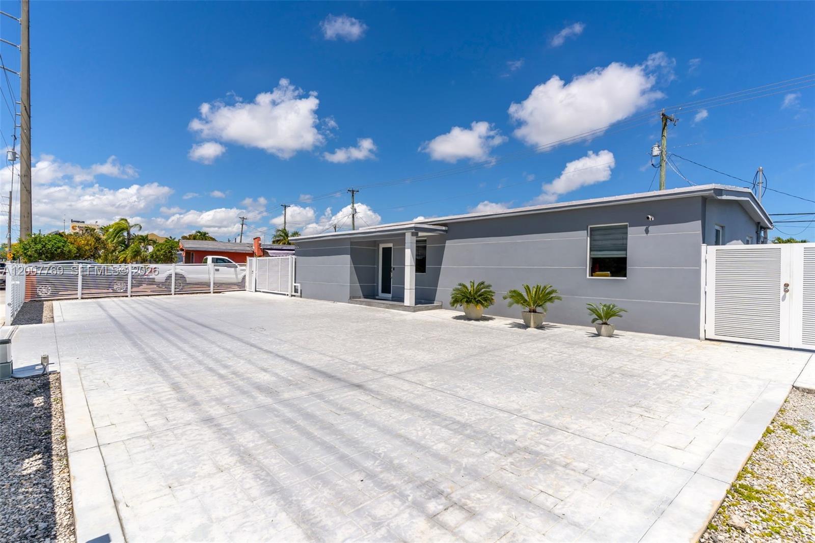 4041 Southwest 117th Avenue Miami, FL 33175 - Photo 6 of 47 a view of a house with a patio