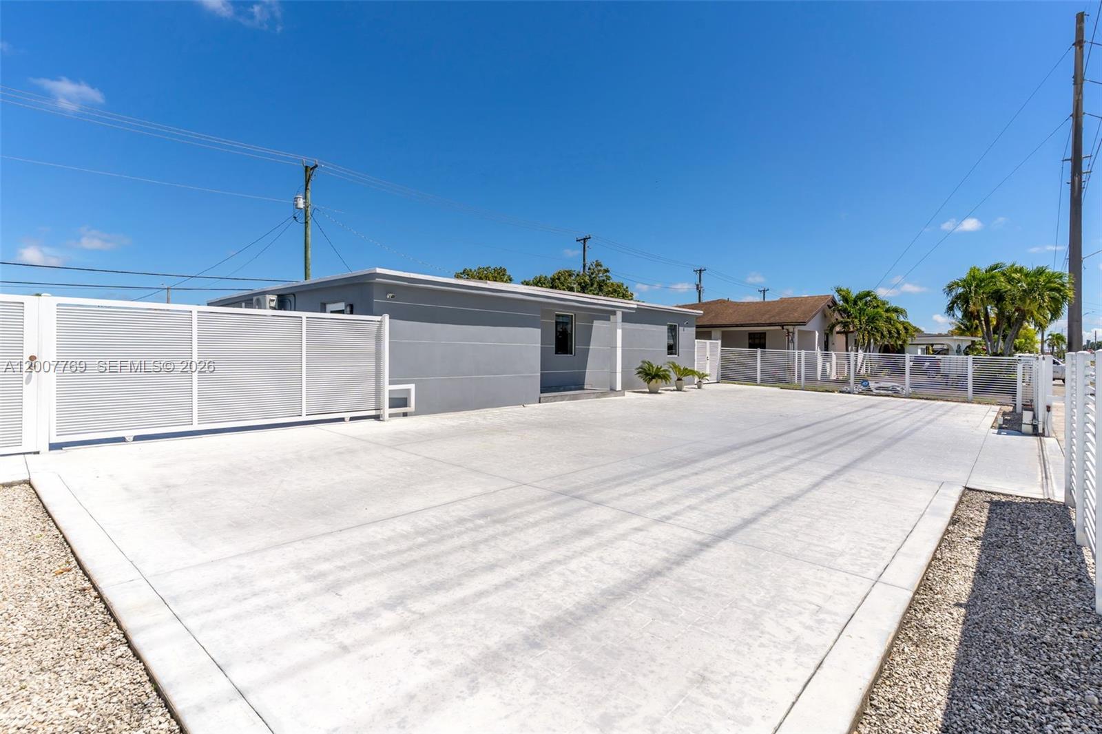 4041 Southwest 117th Avenue Miami, FL 33175 - Photo 7 of 47 a view of a house with a outdoor space