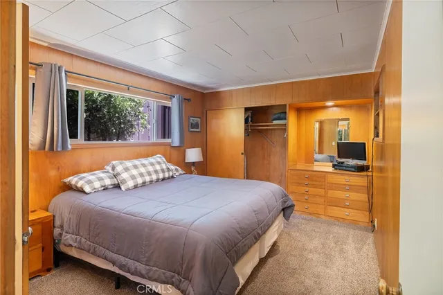 a view of a town with mountains in the background