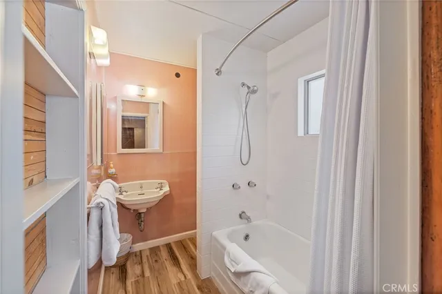 a view of backyard with large trees and outdoor seating