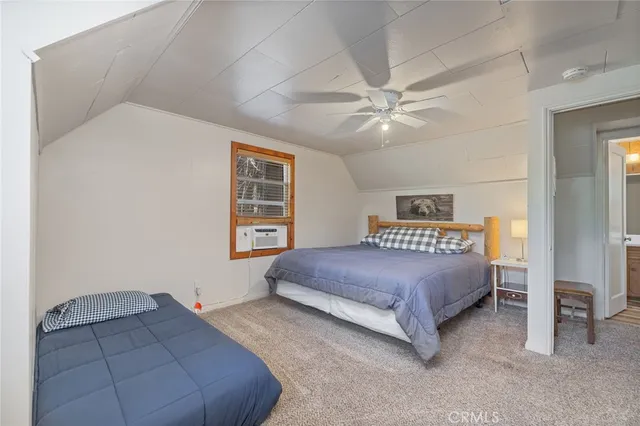 a view of porch with green trees in front