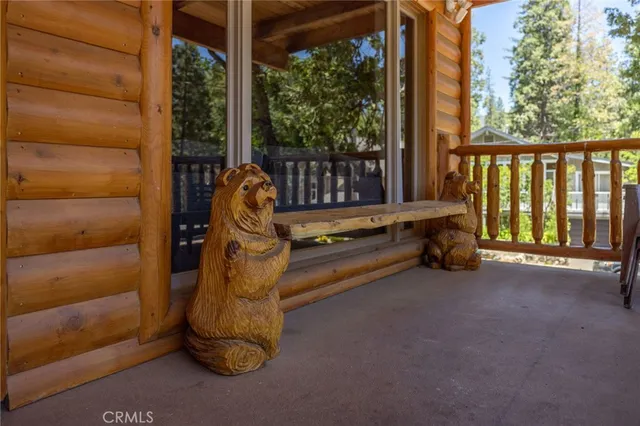a backyard of a house with barbeque oven