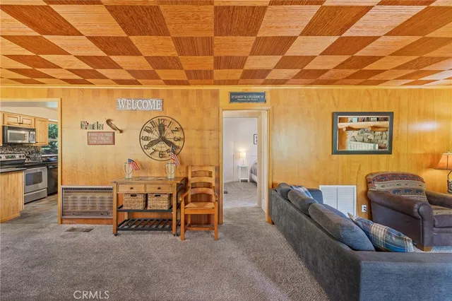 a view of an entryway with wooden wall