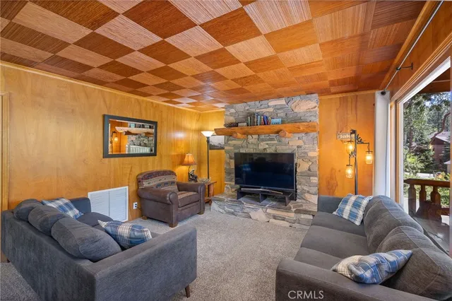 a kitchen with a stove a sink and a microwave