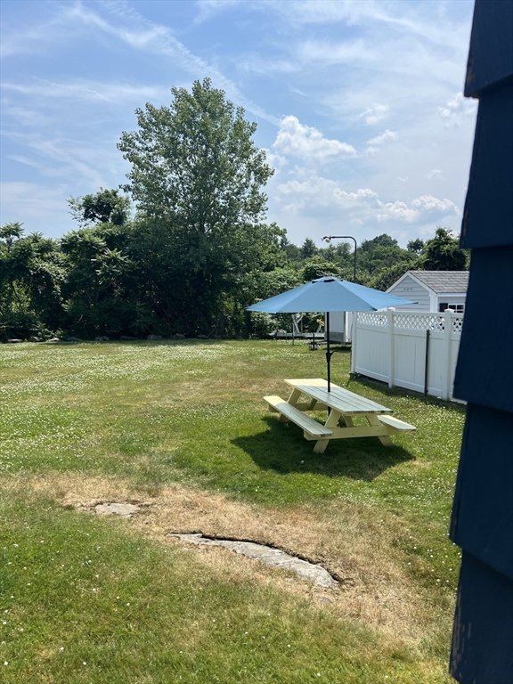 31 Haley Road, Unit A Marblehead, MA 01945 - Photo 17 of 18 a view of a swimming pool with a yard