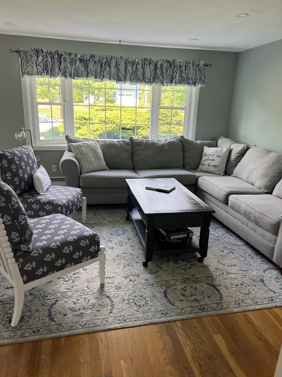 31 Haley Road, Unit A Marblehead, MA 01945 - Photo 3 of 18 a living room with furniture and a large window