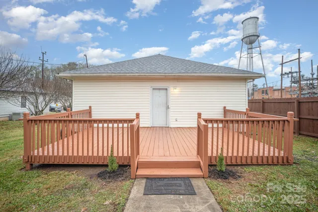 a view of a deck with a yard