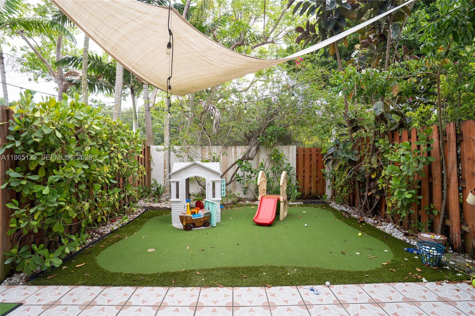 10982 Southwest 75th Terrace Miami, FL 33173 - Photo 19 of 31 a view of a two chairs in the patio