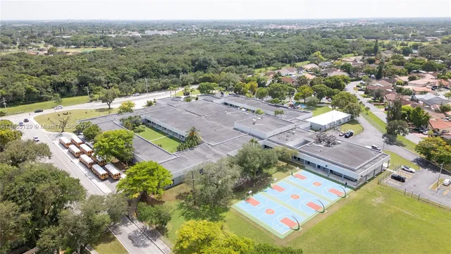 an aerial view of a house with a garden