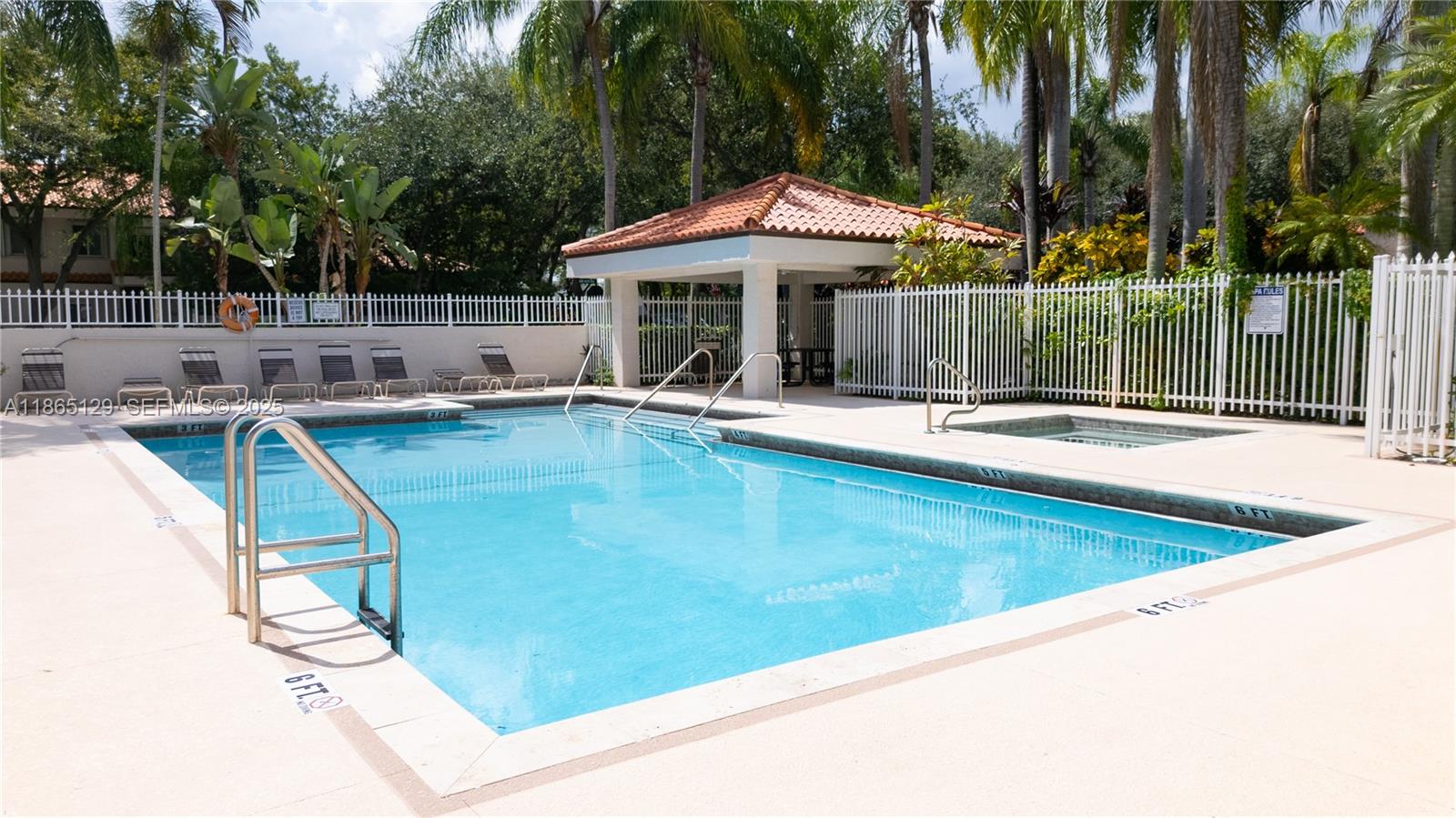 10982 Southwest 75th Terrace Miami, FL 33173 - Photo 26 of 31 a view of a house with swimming pool and sitting area