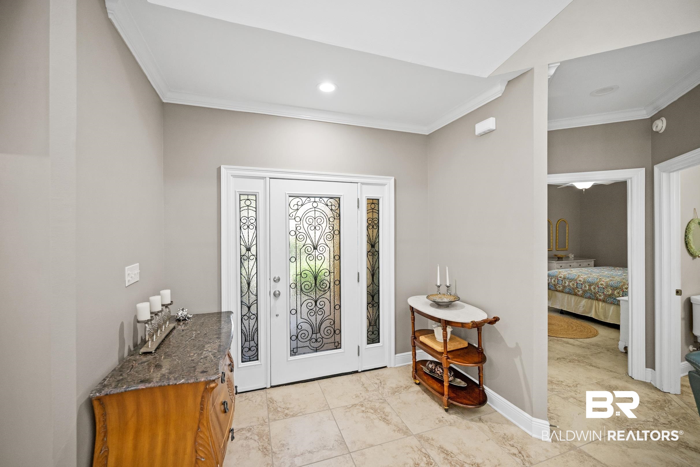 5217 Greentree Road Orange Beach, AL 36561 - Photo 50 of 58 Entryway featuring ornamental molding and recessed lighting