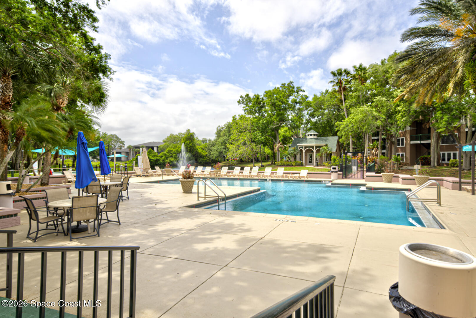 7667 North Wickham Road, Unit 1416 Melbourne, FL 32940 - Photo 30 of 41 a view of a swimming pool with a patio
