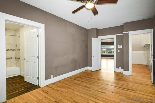 a bathroom with a sink mirror toilet and bathtub