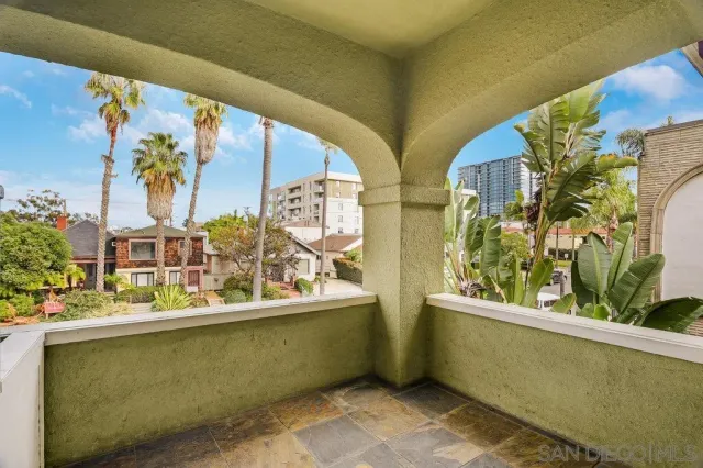 a view of a swimming pool with a patio