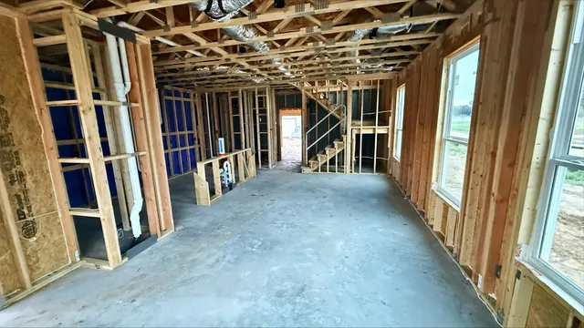 a view of a hallway with stairs