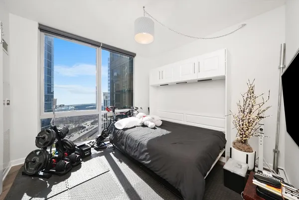 a workspace with furniture and a window