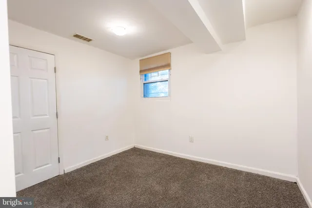 an empty room with a workbench