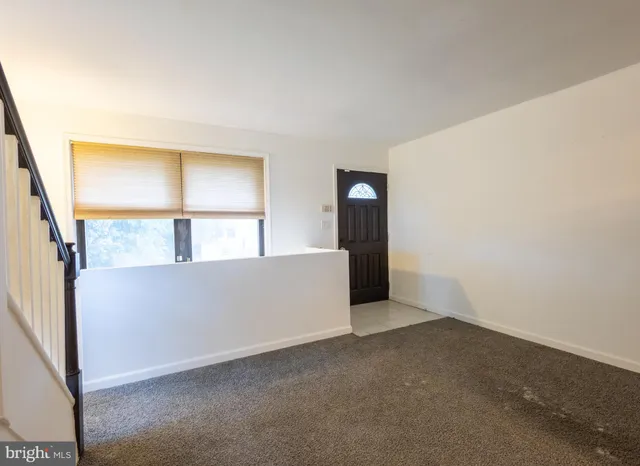 an empty room with window