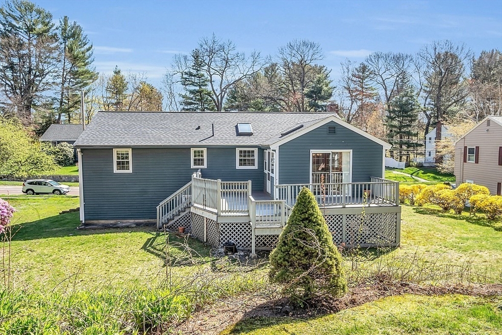 31 Hemlock Road Reading, MA 01867 - Photo 2 of 28 a front view of a house with garden