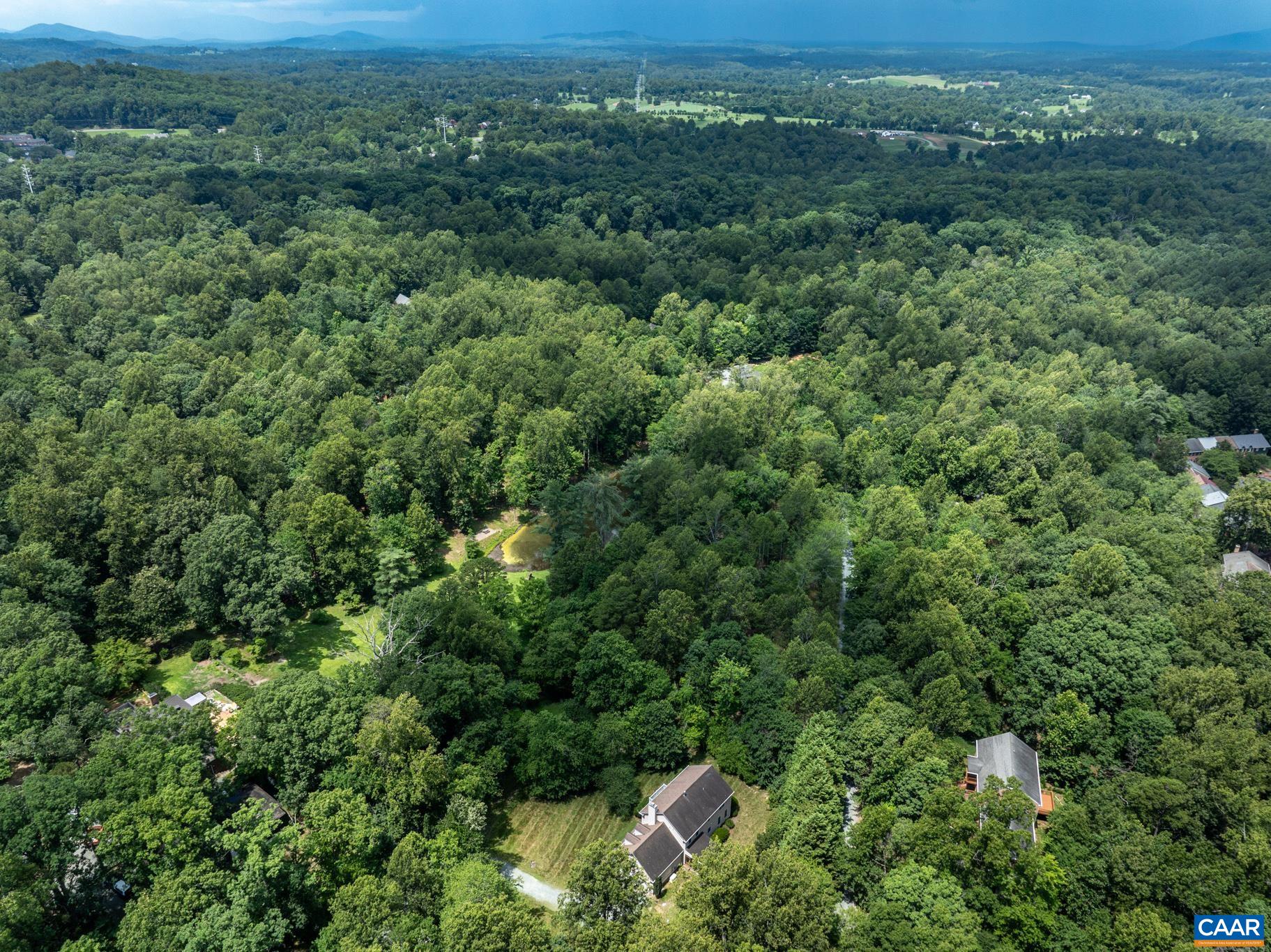 505 Georgetown Road Charlottesville, VA 22901 - Photo 18 of 73 an aerial view of residential houses with outdoor space and trees