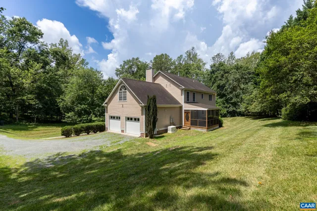 a kitchen with kitchen island a sink stainless steel appliances and cabinets