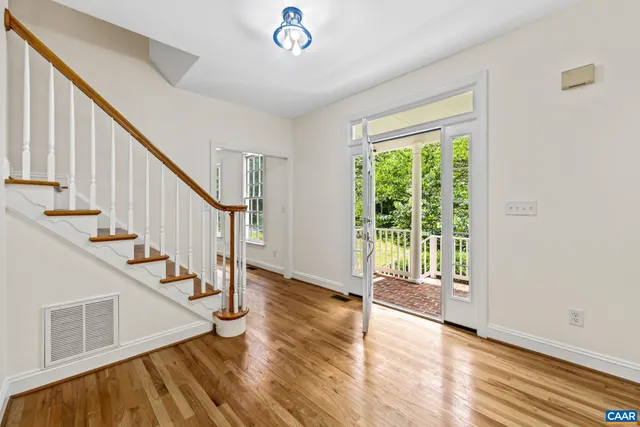 a view of kitchen with stainless steel appliances refrigerator oven and stove