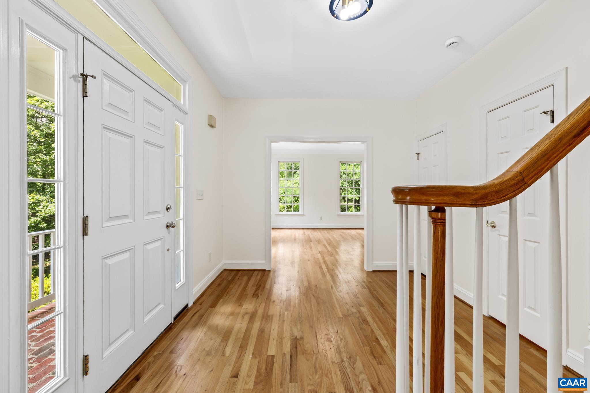 505 Georgetown Road Charlottesville, VA 22901 - Photo 30 of 73 a view of entryway with wooden floor and windows