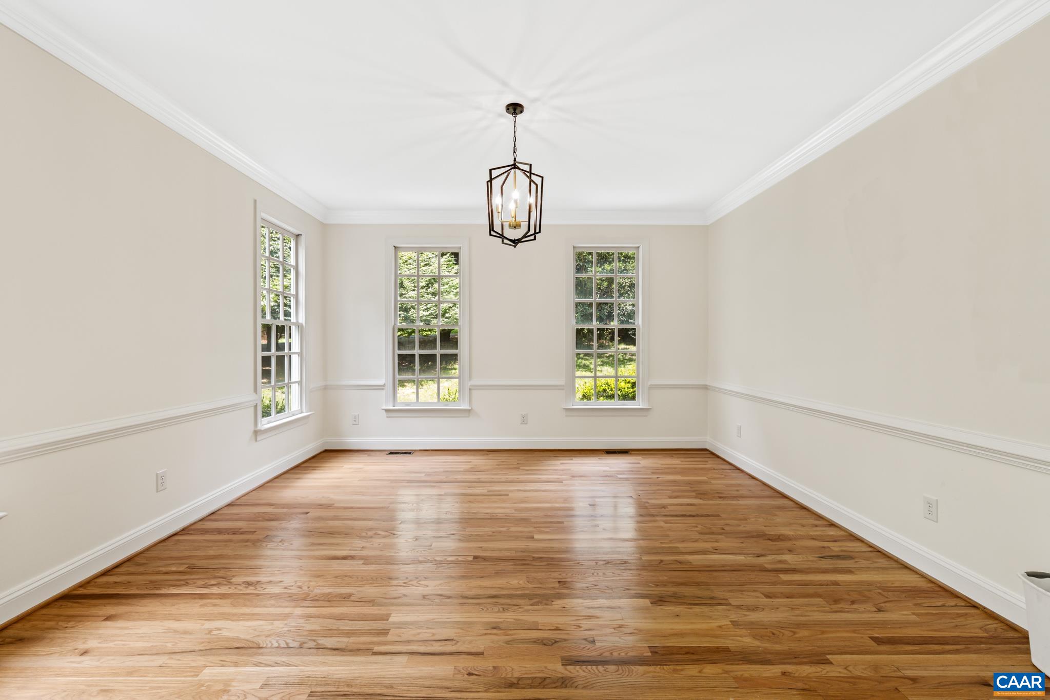 505 Georgetown Road Charlottesville, VA 22901 - Photo 33 of 73 a view of an empty room with wooden floor and window