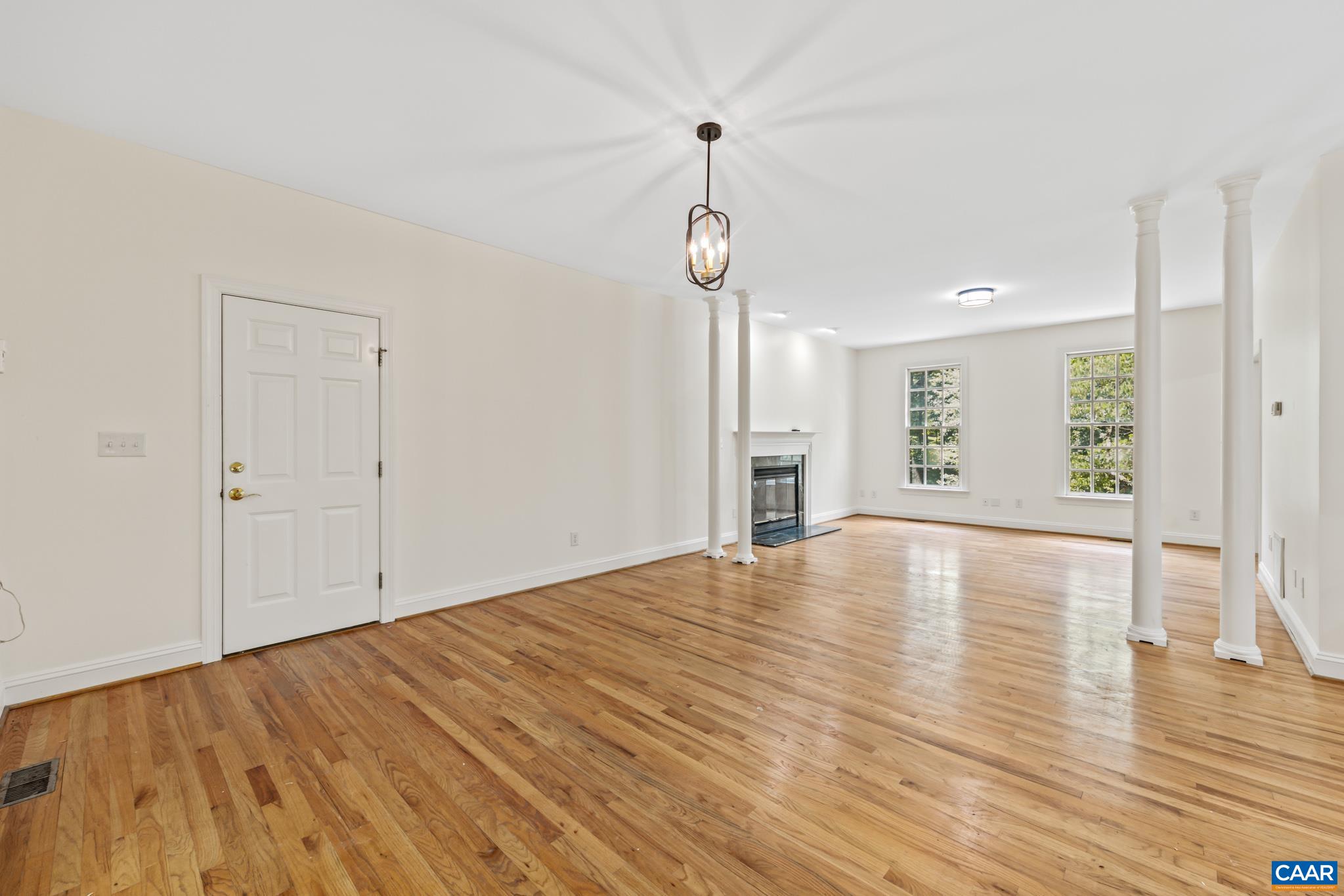 505 Georgetown Road Charlottesville, VA 22901 - Photo 40 of 73 a view of empty room with wooden floor and window