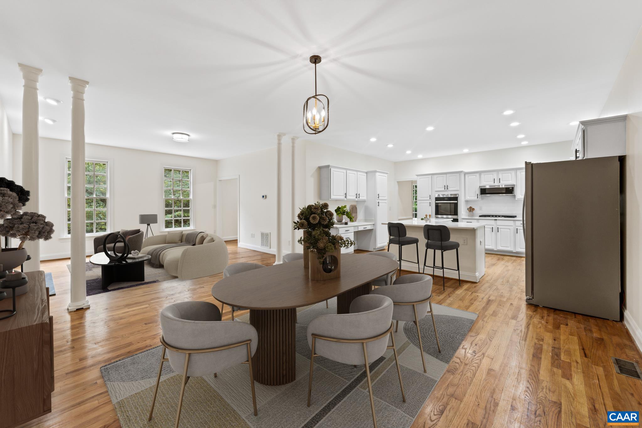 505 Georgetown Road Charlottesville, VA 22901 - Photo 49 of 73 a living room with furniture kitchen view and a wooden floor