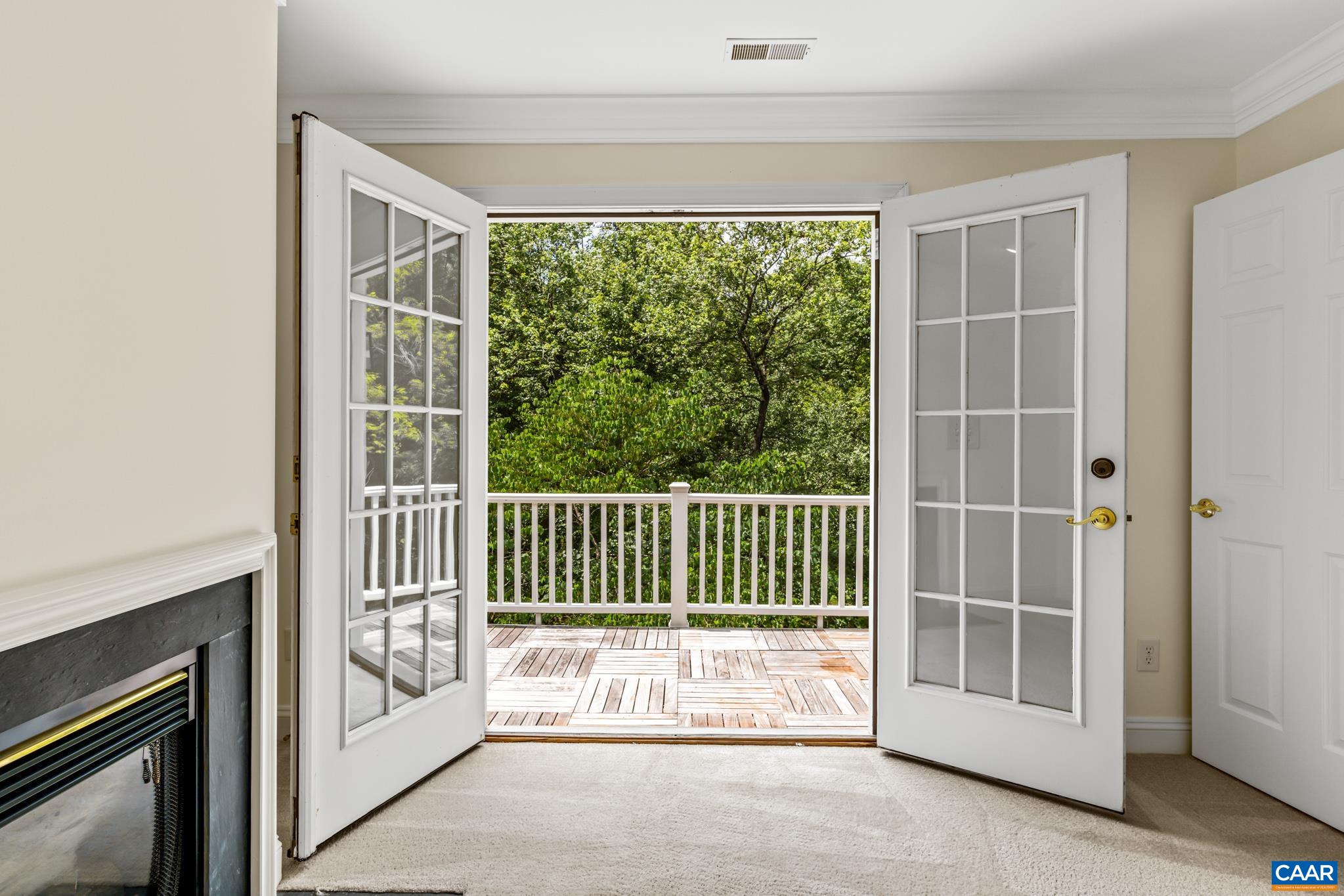 505 Georgetown Road Charlottesville, VA 22901 - Photo 56 of 73 a view of a porch with a floor to ceiling window