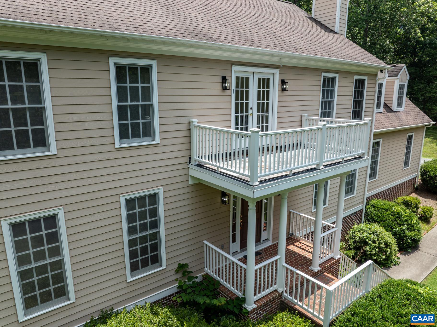 505 Georgetown Road Charlottesville, VA 22901 - Photo 58 of 73 a front view of a house with a garden