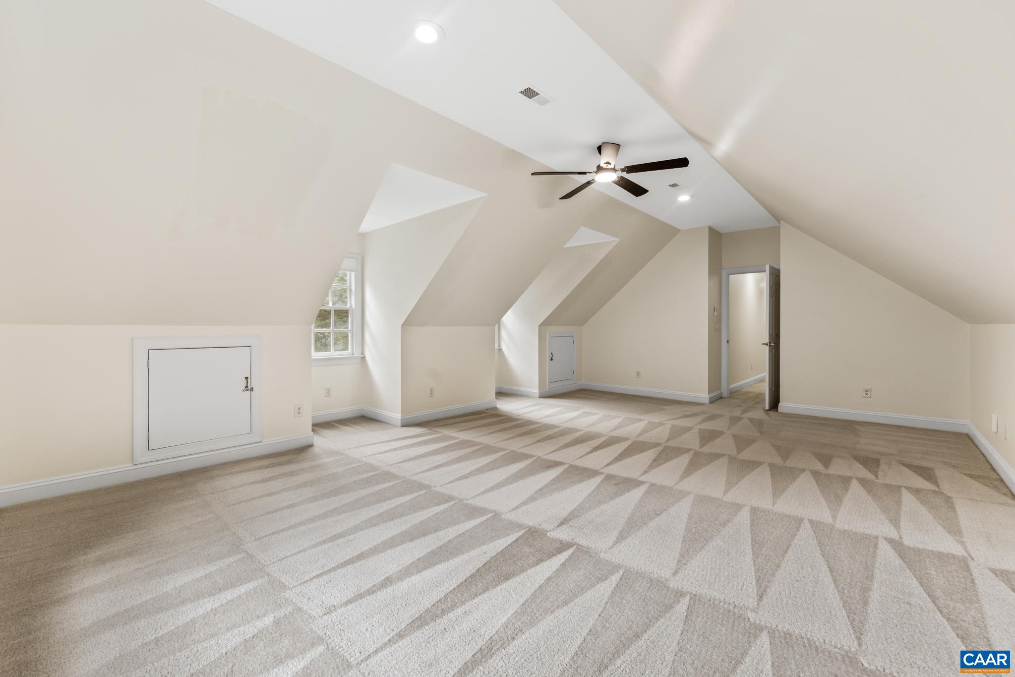 505 Georgetown Road Charlottesville, VA 22901 - Photo 71 of 73 a view of empty room with stairs and a ceiling fan