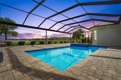 a view of swimming pool with a patio