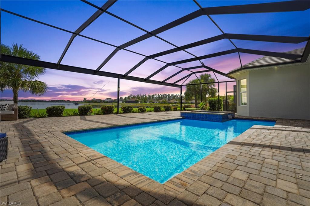 a view of swimming pool with a patio