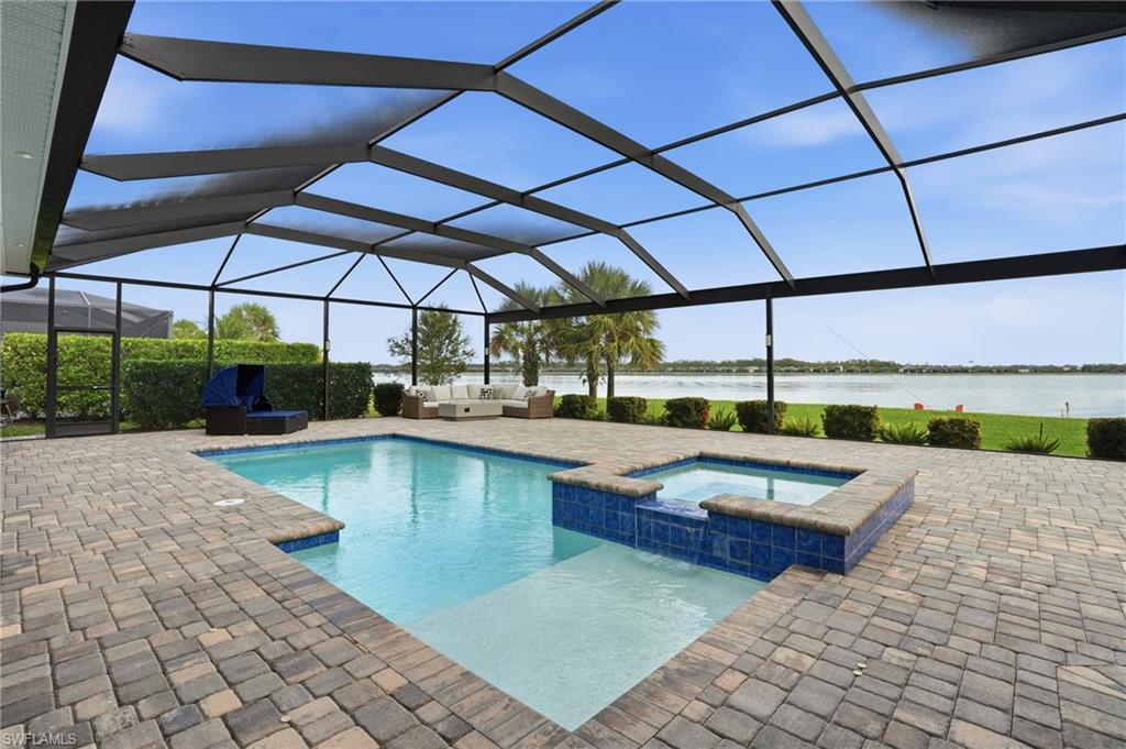 14882 Blue Bay Circle Fort Myers, FL 33913 - Photo 39 of 50 a view of a swimming pool with a patio