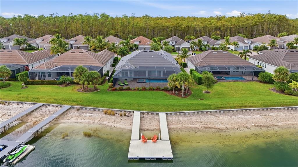 14882 Blue Bay Circle Fort Myers, FL 33913 - Photo 41 of 50 an aerial view of residential houses with outdoor space and river