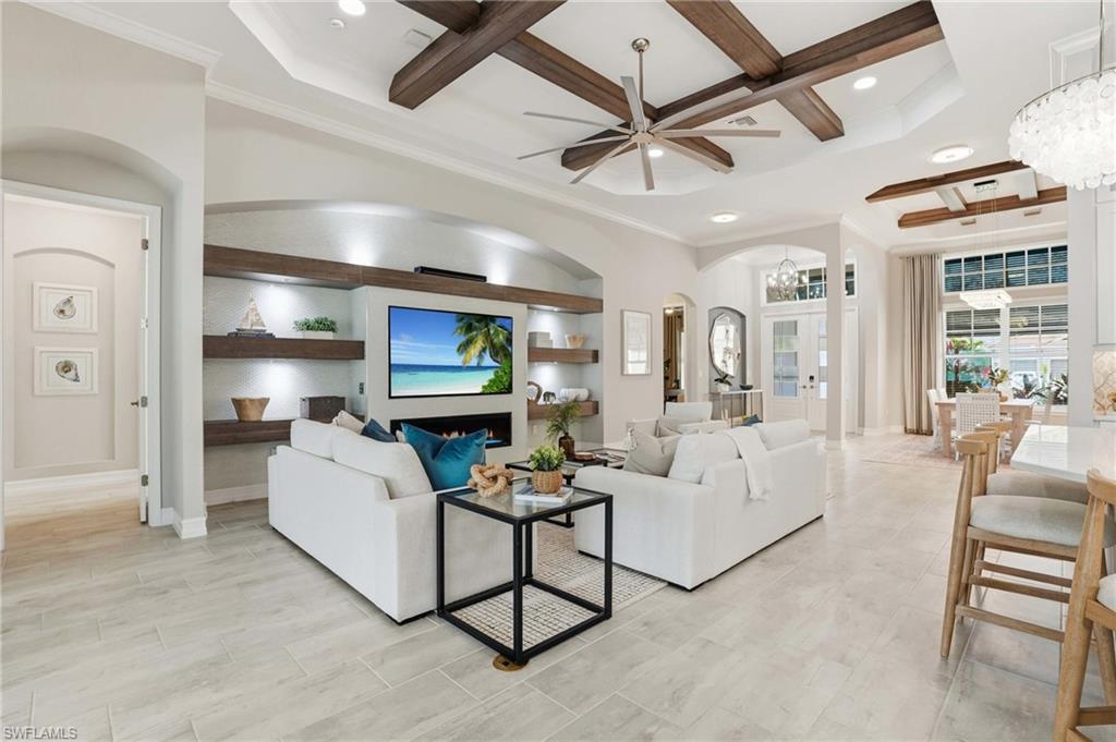 14882 Blue Bay Circle Fort Myers, FL 33913 - Photo 10 of 50 a living room with furniture and a flat screen tv