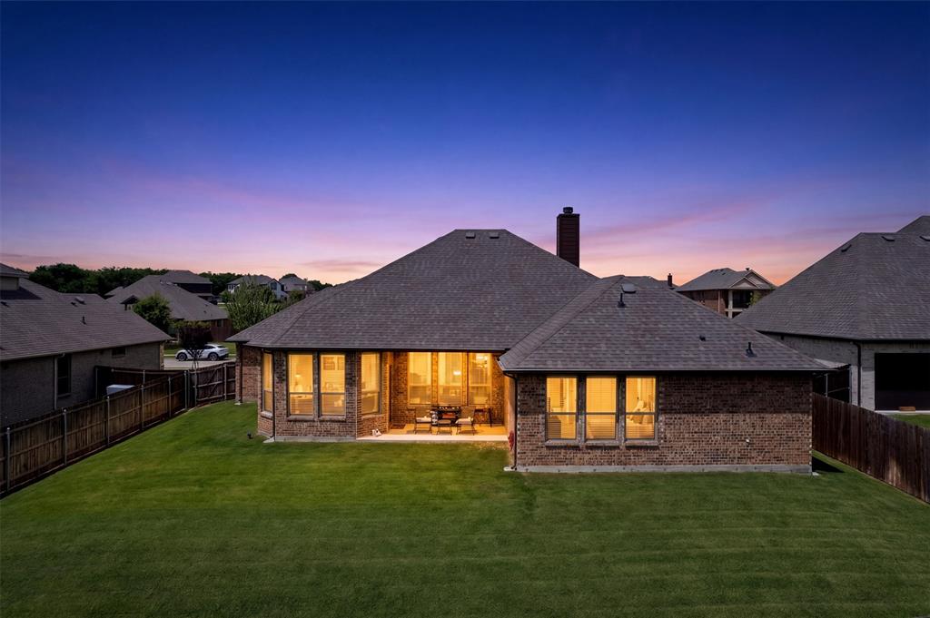 2618 Byrd Ranch Road Midlothian, TX 76065 - Photo 2 of 38 a front view of a house with a yard