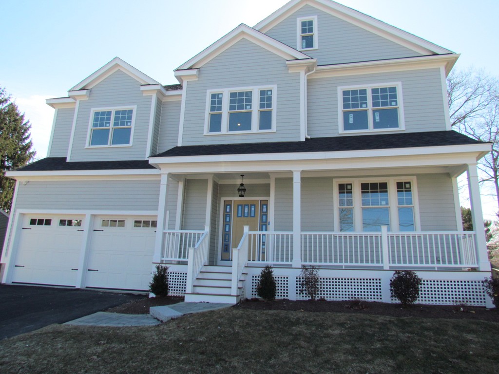 24 Gary Road Needham, MA 02494 - Photo 1 of 8 front view of a house with a yard