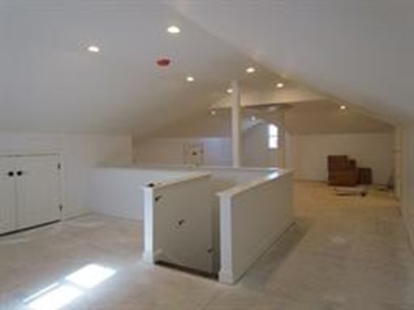 24 Gary Road Needham, MA 02494 - Photo 2 of 8 a bathroom with a sink a toilet and mirror