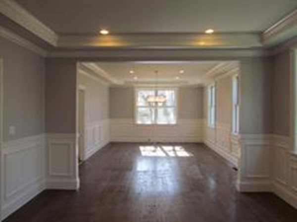24 Gary Road Needham, MA 02494 - Photo 6 of 8 an empty room with wooden floor and windows
