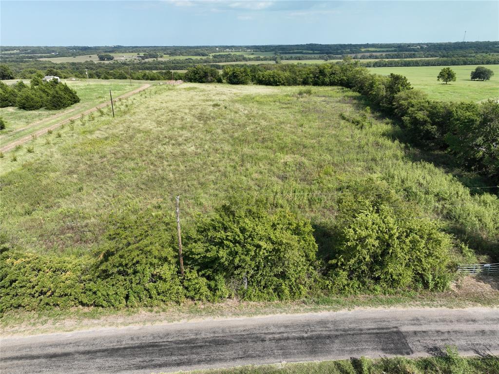 0 Hall Road Sherman, TX 75090 - Photo 6 of 11 a view of a lake from a yard